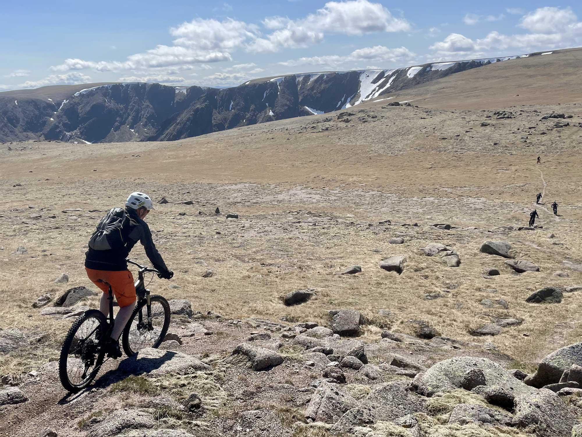 Mountain Bike Rider on mountain tops in Ballater Deeside